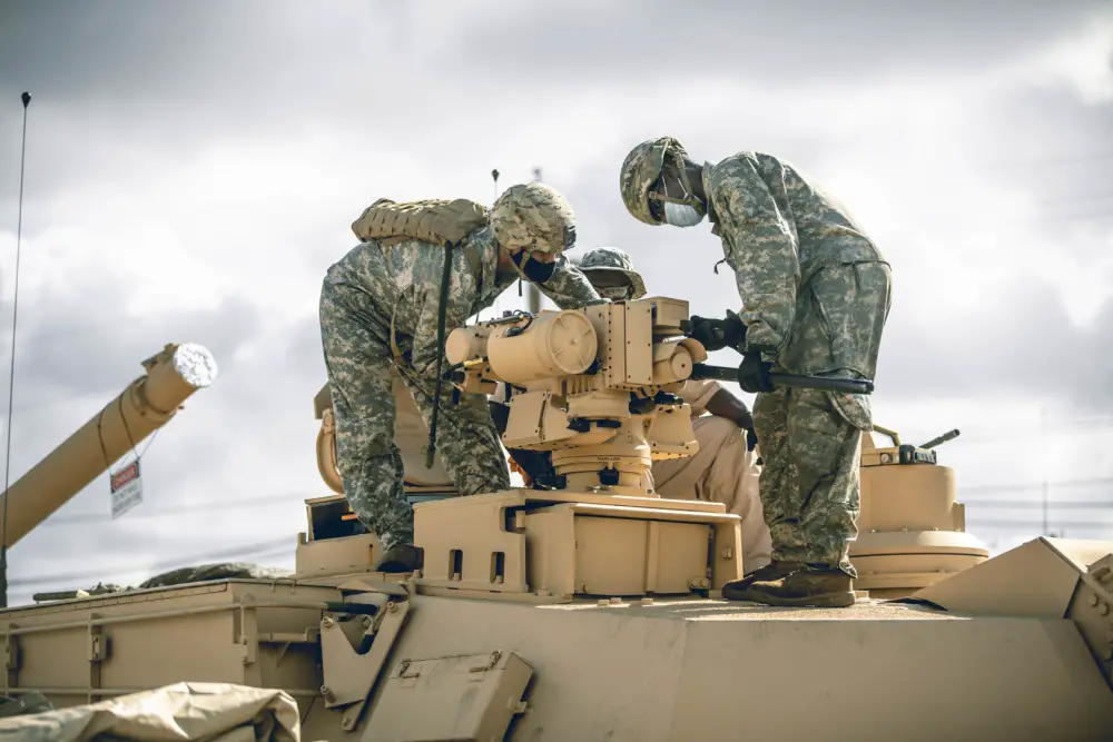 Troopers assigned to Bravo Company, 3rd Battalion, 8th Cavalry Regiment, 3rd Armored Brigade Combat Team (3ABCT), 1st Cavalry Division, conduct preventative maintenance checks and services on their new M1A2C (SEP v.3) Abrams Tanks at Fort Hood, Texas, July 21, 2020. 