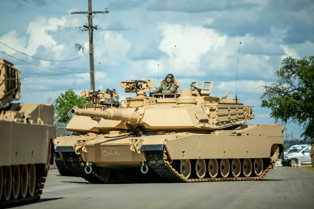 Troopers assigned to Bravo Company, 3rd Battalion, 8th Cavalry Regiment, 3rd Armored Brigade Combat Team (3ABCT), 1st Cavalry Division, stage the first set of new M1A2C (SEP v.3) Abrams Tanks at Fort Hood, Texas, July 21, 2020.