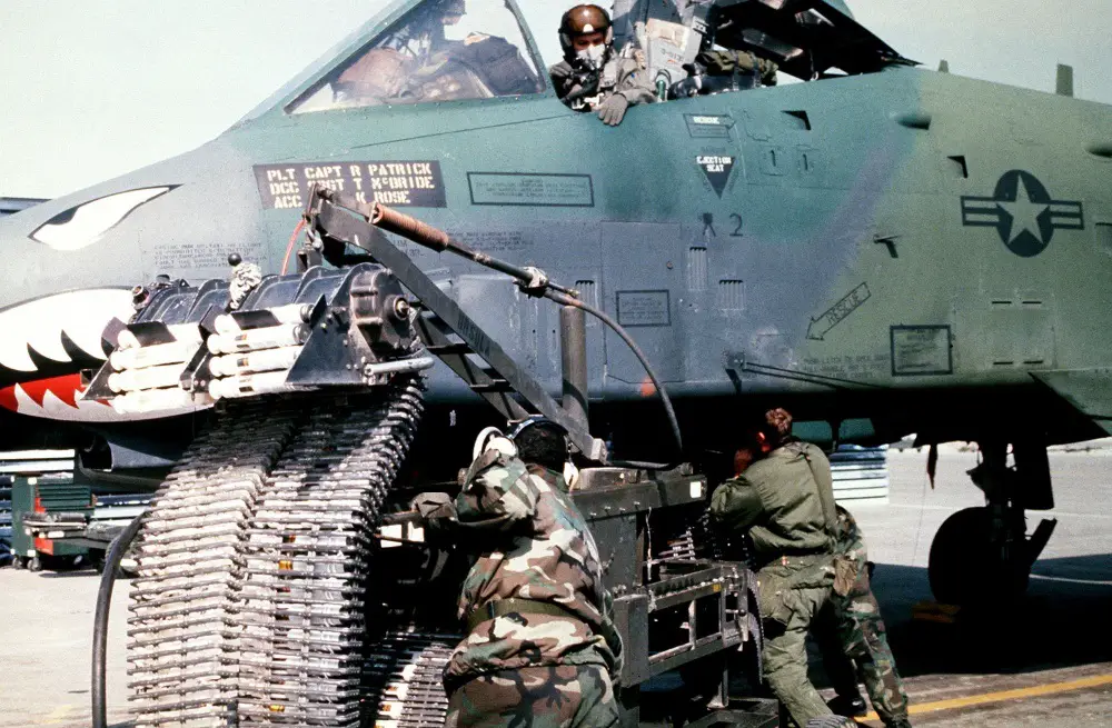 Munitions specialists from the 23rd Tactical Fighter Wing, England Air Force Base, La., load 30 mm rounds of ammunition into an A-10A Thunderbolt II attack aircraft for its GAU-8/A Avenger cannon prior to a sortie in support of Operation Desert Storm.