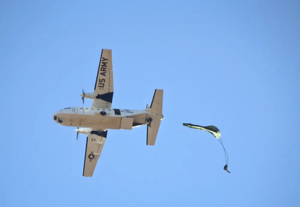 A paratrooper jumps from a CASA 212 212-200 aircraft, during Operation Toy Drop.