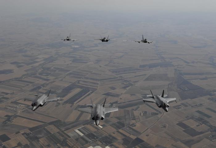 U.S. Air Force F-35A Lightning II aircraft conduct bilateral training with Italian air force F-35s over Italy,