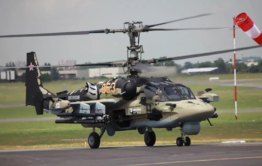A Ka-52 attack helicopter with launchers for Vikhr-1 missiles