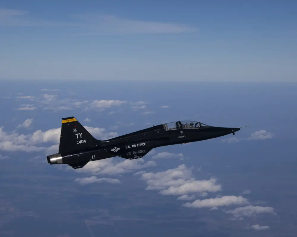 A T-38 Talon with the 2nd Fighter Training Squadron, Tyndall Air Force Base, Fla., begins to climb in altitude en route to a training range over the Gulf of Mexico