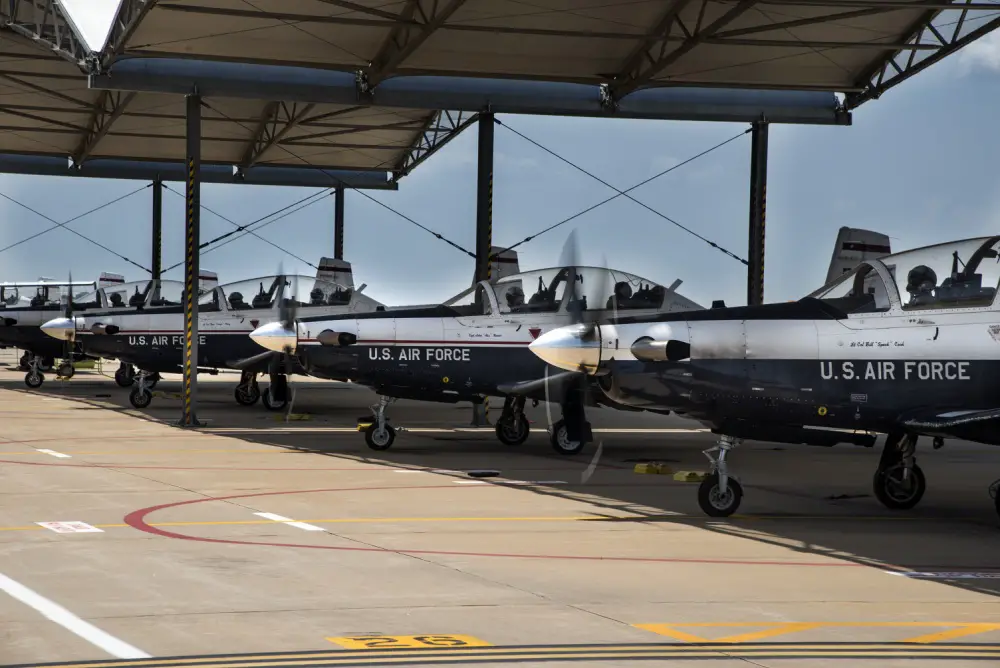 Vance pilots prepare a T-6 Texan II for a training flight June 13, 2018, at Vance Air Force Base, Oklahoma. The T-6 Texan II is the first aircraft Air Force Pilots learn to fly before moving on to more advanced aircraft.