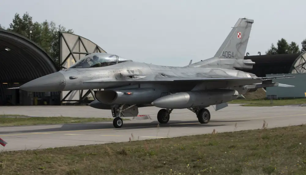 A Polish air force F-16, assigned to the 32nd Tactical Air Base, taxis out of a hangar at Åask AB, Poland, August 19, 2020. 