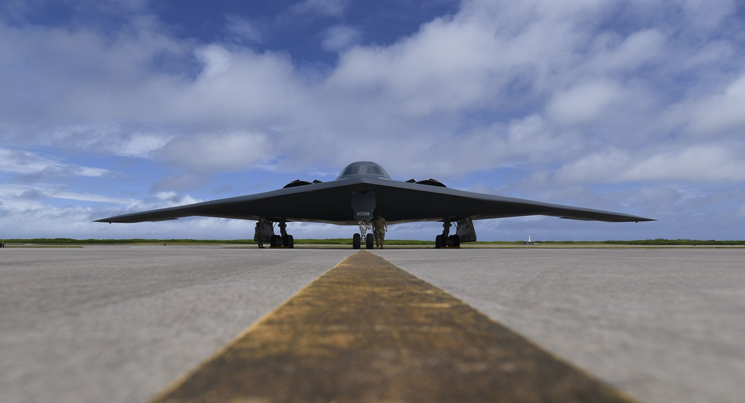 U.S. Air Force Senior Airman Robert Witkowski and Staff Sgt. Mark Farrar, 393rd Expeditionary Bomb Squadron crew chiefs, deployed from Whiteman Air Force Base, Missouri, prepare a B-2 Spirit Stealth Bomber for take-off at Naval Support Facility Diego Garcia, to support a Bomber Task Force mission, Aug. 17, 2020.
