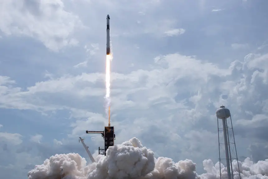 A SpaceX Falcon 9 rocket, carrying the company's Crew Dragon spacecraft