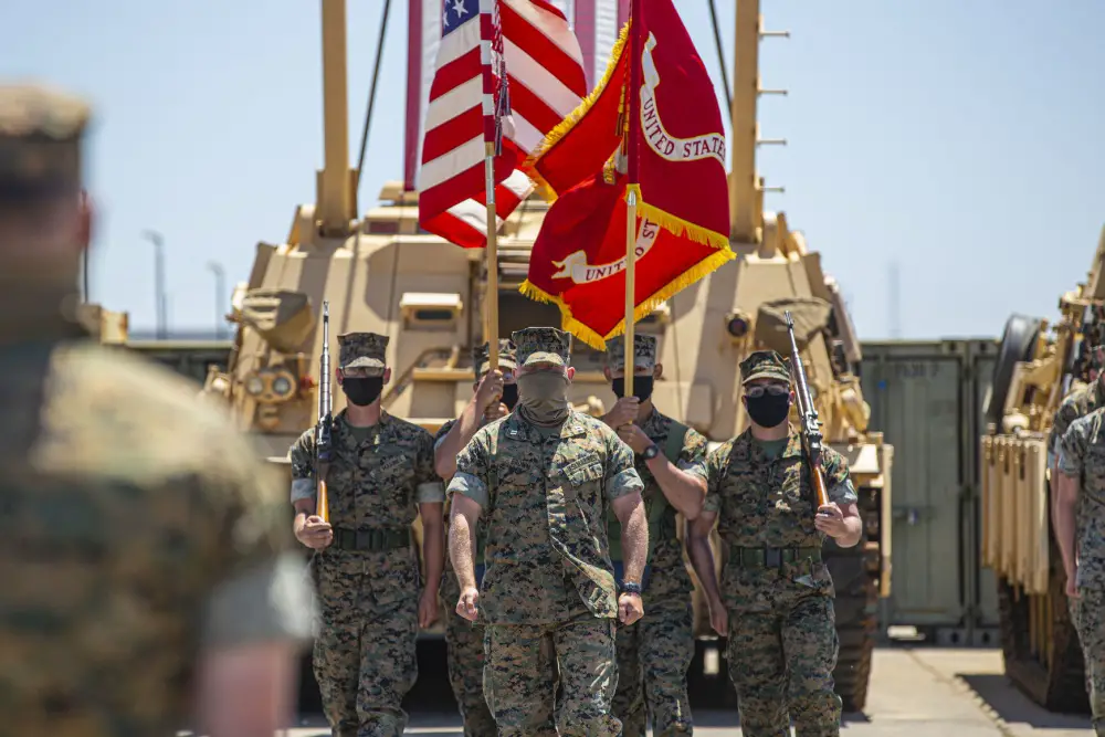  Alpha Company, 4th Tank Battalion, 4th Marine Division, Marine Forces Reserve, marches forward with the color guard during the company's deactivation ceremony in 41 Area on Marine Corps Base Camp Pendleton, California.