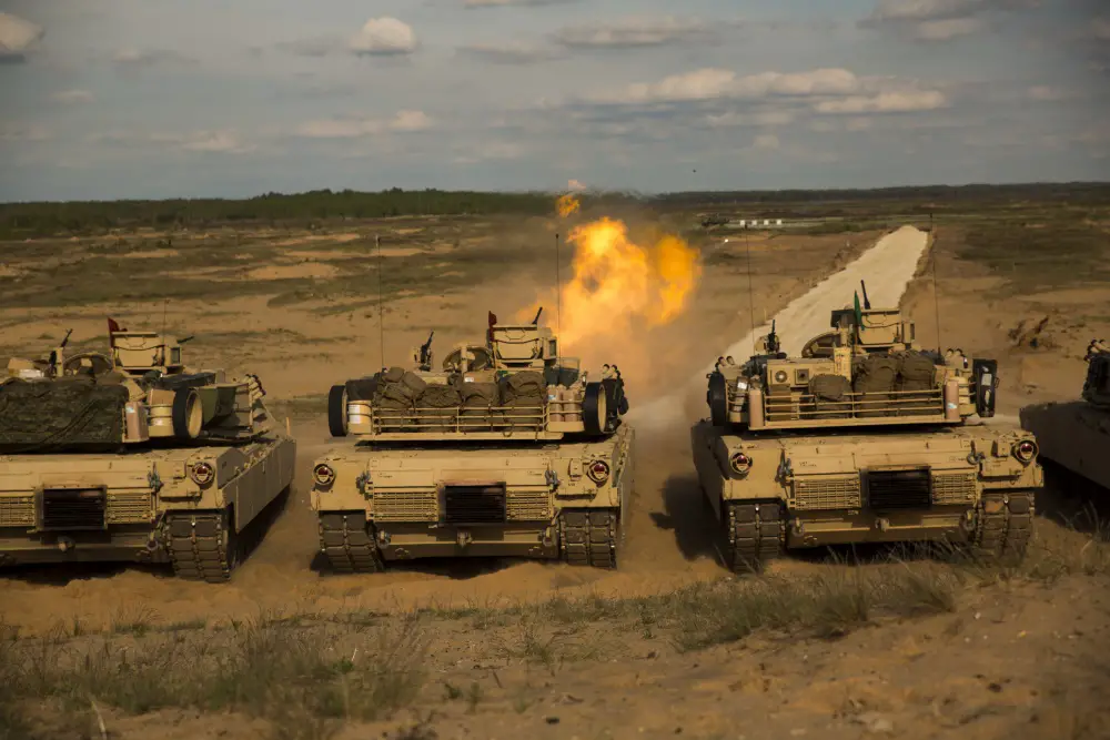 Marines with Alpha Company, 4th Tank Battalion, 4th Marine Division, Marine Forces Reserve, fire from a M1 Abrams tank during Exercise Saber Strike 17 in the Adazi Training Area, Latvia,