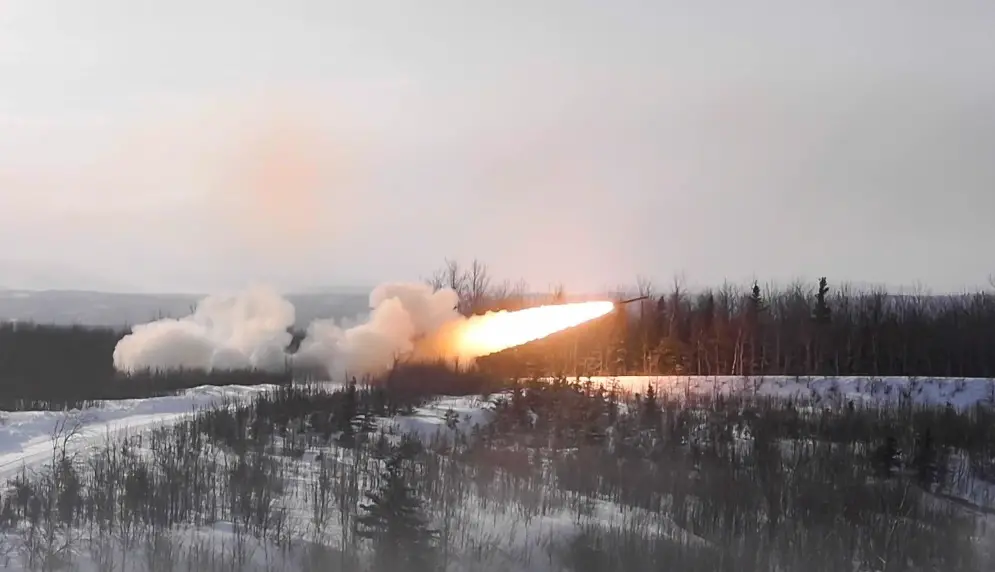 U.S. Marines from 5th Battalion, 11th Marine Regiment, shoot a M142 High Mobility Artillery Rocket System (HIMARS) during U.S. Northern Command's Exercise Arctic Edge, Fort Greely, Alaska, Mar. 3, 2020.