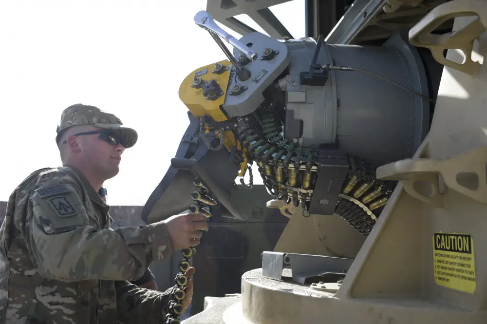 U.S. Army Specialist James Finn, B Battery, 2nd Bn 44th Air Defense Artillery Regiment, loads rounds into a Counter Rocket, Artillery and Mortar system at Bagram Airfield, Afghanistan. (Photo, Ben Santos, US Forces Afghanistan public affairs)