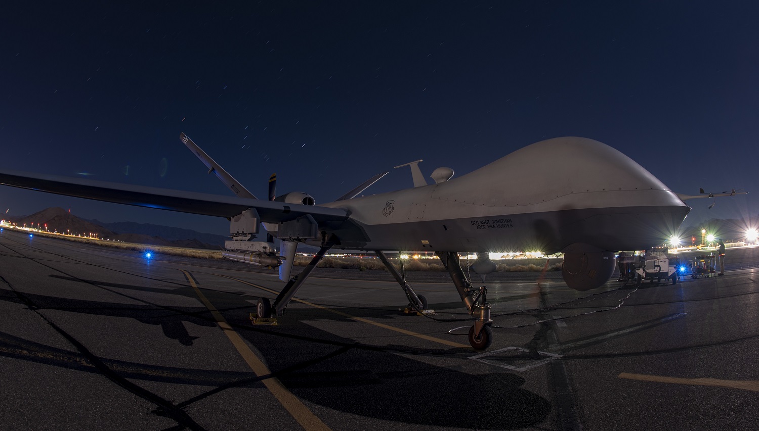 US Air Force MQ-9 Reaper UAV Fires AIM-9X Air-to-Air Missile