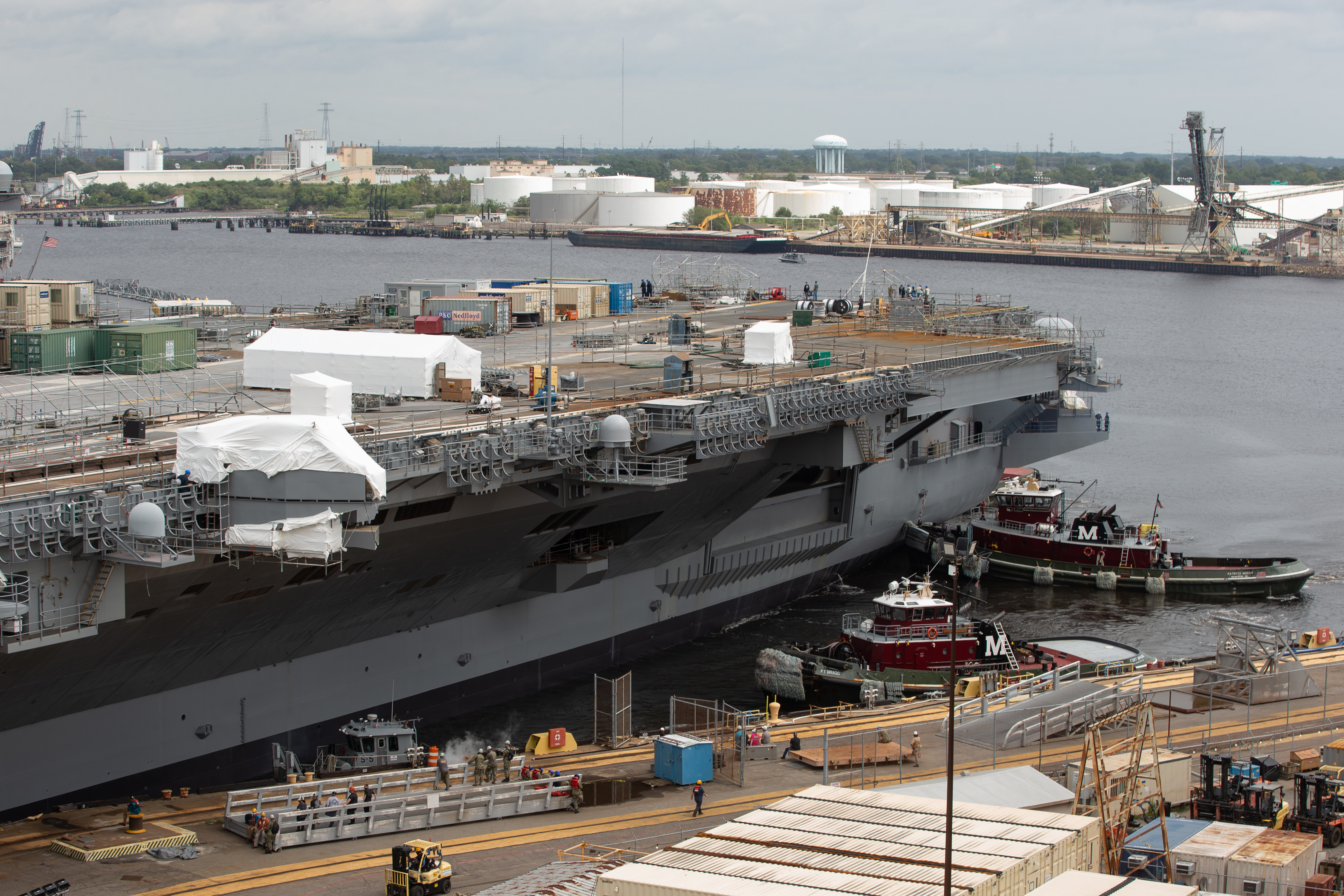 Norfolk Naval Shipyard (NNSY) undocked USS George H.W. Bush (CVN 77) on time Aug. 29, a key milestone in the carrier's Drydocking Planned Incremental Availability (DPIA).