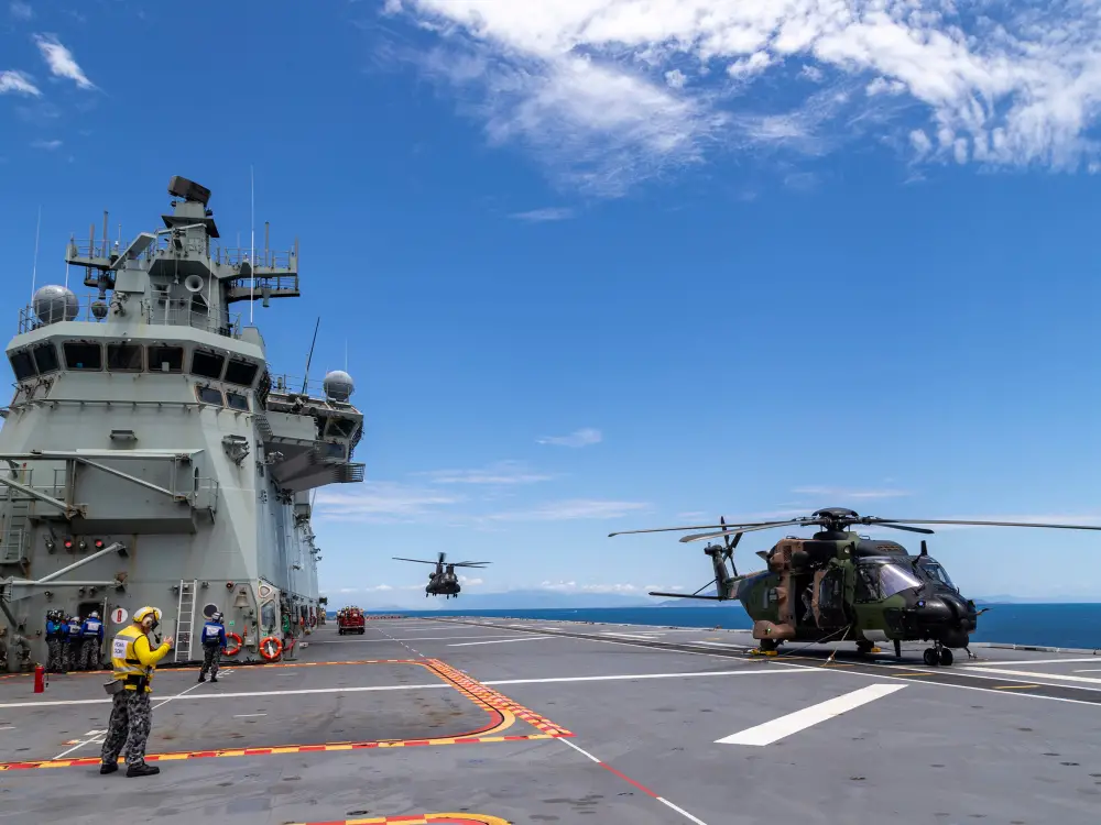 A Republic of Singapore Airforce CH-47 Chinook helicopter lands onboard HMAS Adelaide during Exercise SEA WADER 2020, off the coast of Townsville, Queensland.