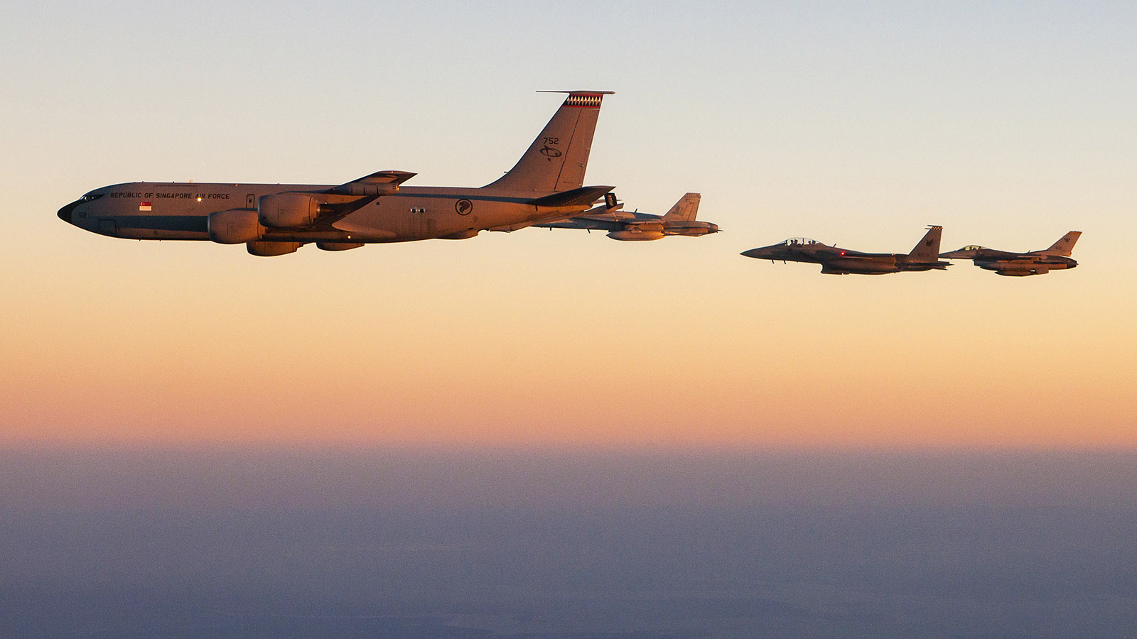 The KC-135R Stratotanker leading a formation of fighters at Exercise Pitch Black in Darwin, Australia.