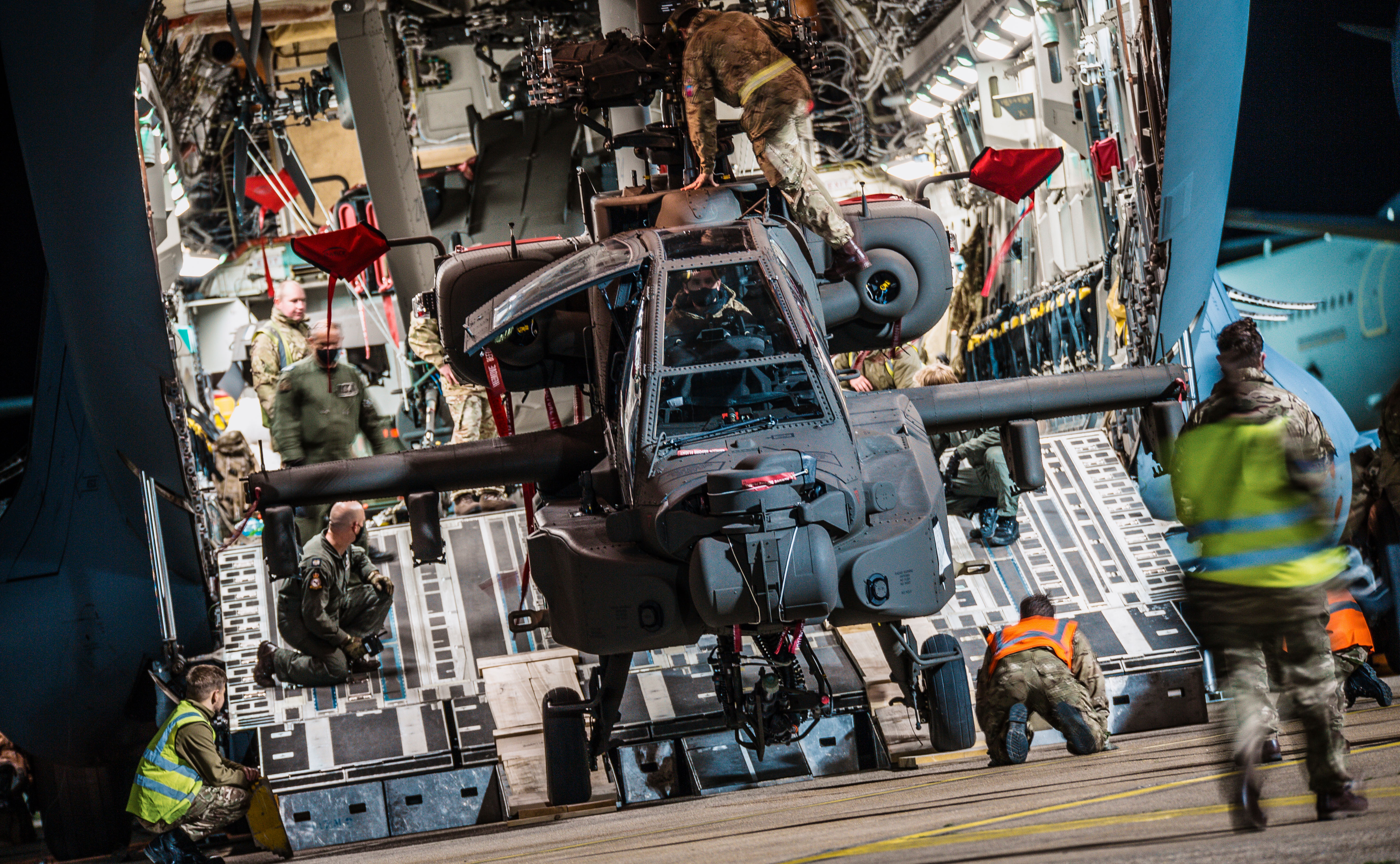 Two new British Army Apache AH-64E Attack Helicopters being off-loaded from Boeing C17 Globemaster at RAF Brize Norton after flying in from Kansas City. (Photographer Cpl Adam Wakefield/ MoD Crown)