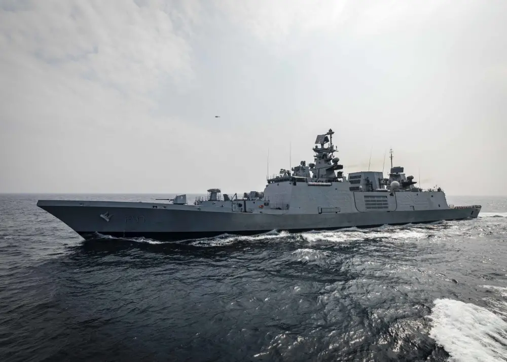 The Indian Navy Shivalik-class stealth multi-role frigate INS Shivalik (F 47) sails alongside the Arleigh Burke-class guided-missile destroyer USS John S. McCain (DDG 56) while conducting replenishment-at-sea approaches (RASAPs) as part of Malabar 2020