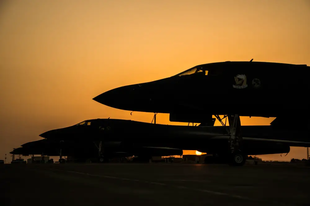 B-1B Lancers sit on the flightline during sunset at Al Udeid Air Base, Qatar, June 27, 2018. The BONE is currently deployed to the U.S. Air Forces Central Command's AOR supporting a wide range of operations. (U.S. Air Force photo by Tech. Sgt. Ted Nichols)