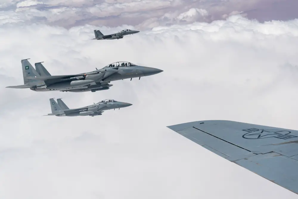 Four Royal Saudi Air Force F-15s fly in formation with U.S. Air Force F-15 Strike Eagles over the U.S. Central Command area of responsibility, Sept 10, 2020.