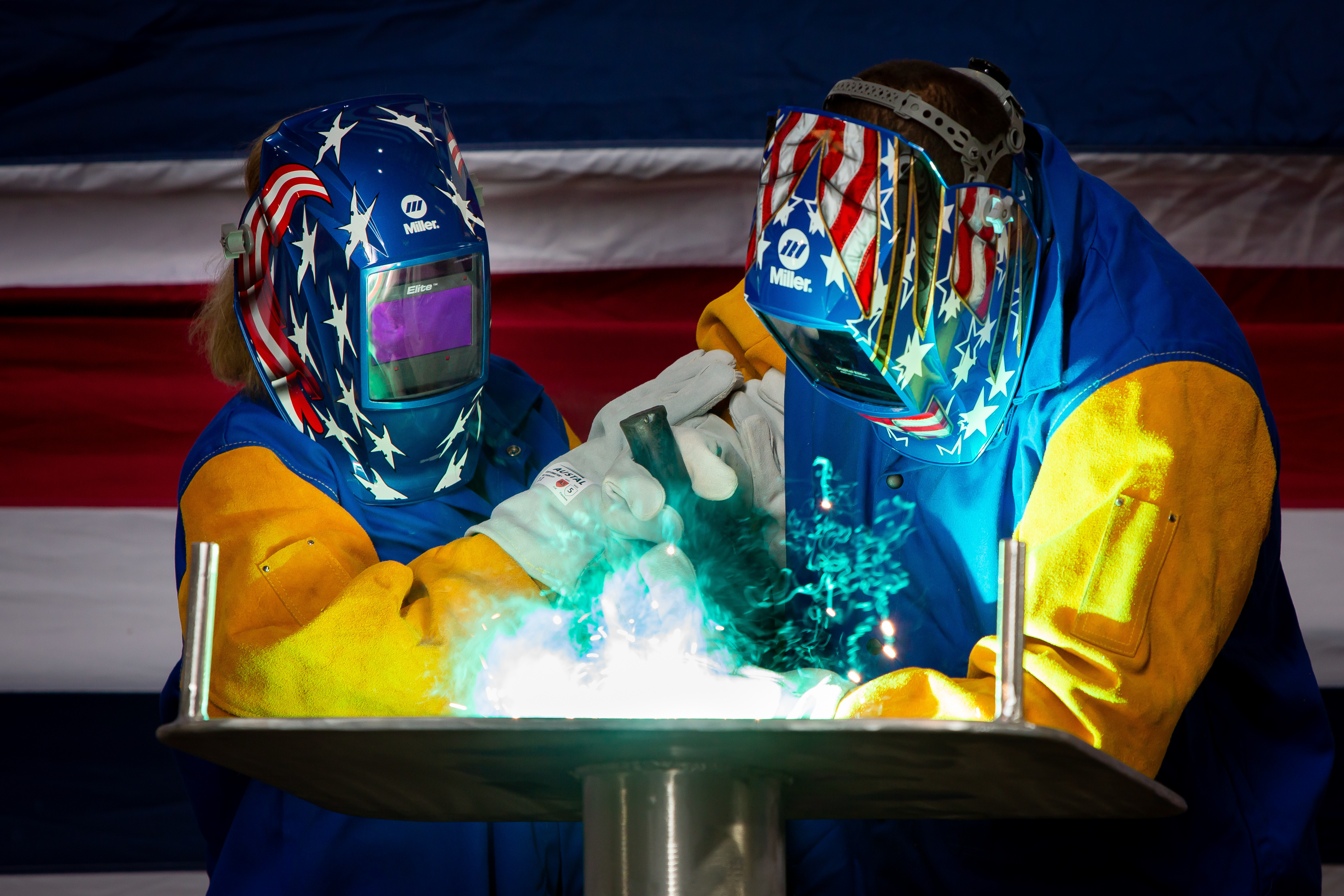 MOBILE, Ala. (Oct. 28, 2020) Lolita Zinke, left, the sponsor of the future littoral combat ship USS Santa Barbara (LCS 32), welds her initials into the ship's keel plate during a keel-laying ceremony at Austal USA in Mobile, Alabama, Oct. 27, 2020. (U.S. Navy photo courtesy of Austal USA)
