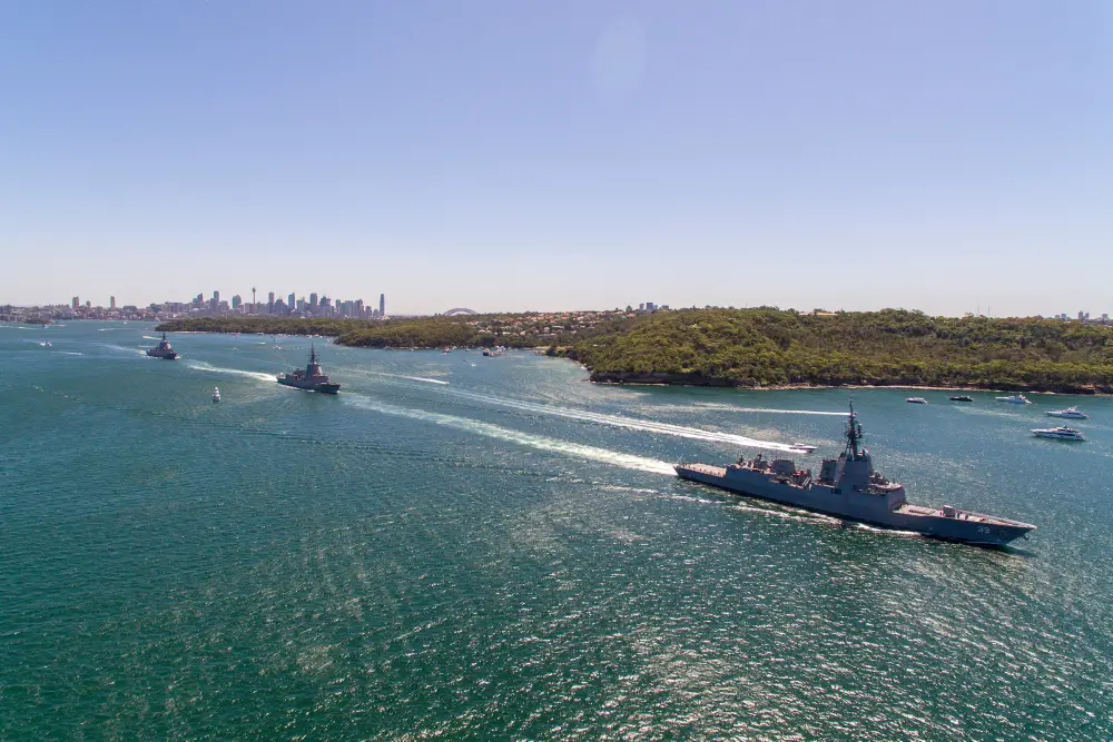 HMA Ships Sydney, Brisbane, and Hobart leave Sydney Harbour to conduct sea trials.