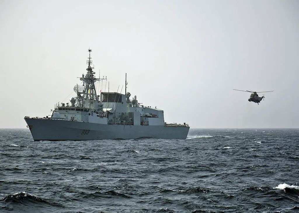 The Royal Canadian Navy frigate HMCS Toronto (FFH 333) launches a helicopter during a ship boarding exercise in the Alboran Sea east of Gibraltar with the U.S. Navy guided-missile cruiser USS Leyte Gulf (CG-55), flagship of the Standing NATO Maritime Group (SNMG) 2.