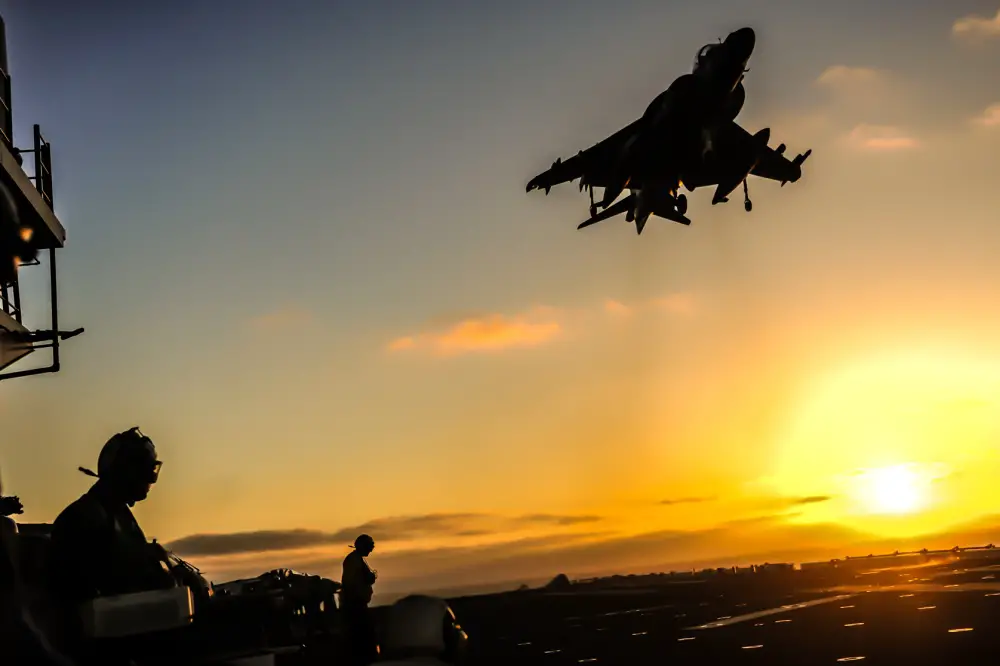 An AV-8B Harrier II assigned to the air combat element of the 13th Marine Expeditionary Unit takes off from the amphibious assault ship USS Boxer (LHD 4). 