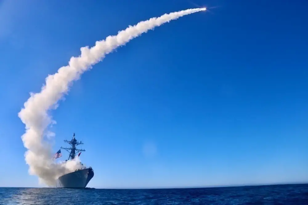 US Navy USS Chafee (DDG 90) Launches Block V Tomahawk Long-range Subsonic Cruise Missiles