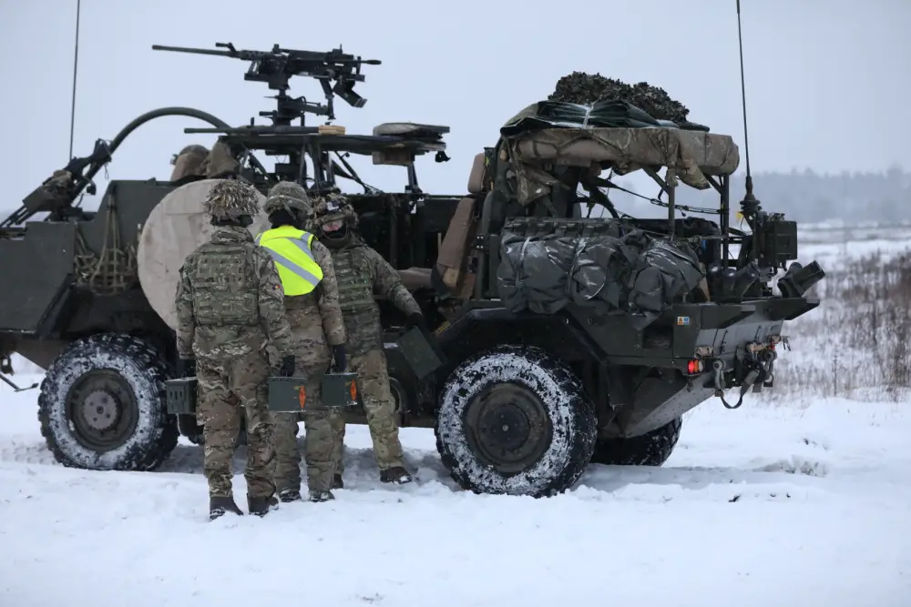 UK Cassino Troops from enhanced Forward Presence Battle Group Polandload ammunition into a jackal during a Platform Weapons Operator Course on a snow-covered range January 14, 2021, at Bemowo Piskie Training Area.