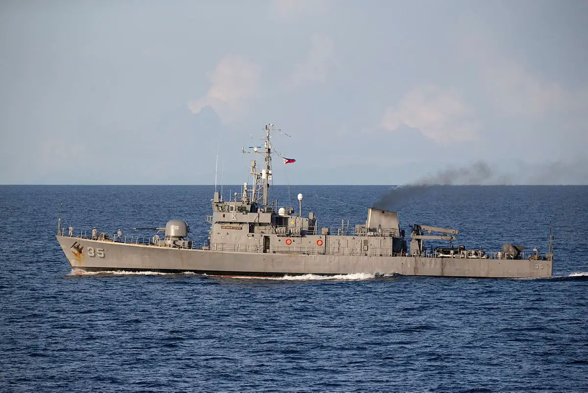 Philippine Navy corvette BRP Emilio Jacinto sails alongside HMAS Anzac during a passage exercise in the Sulu Sea. 