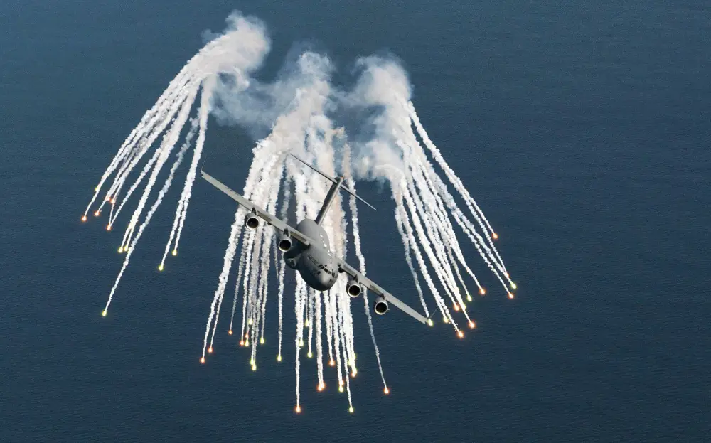 U.S. Air Force C-17 fires flares