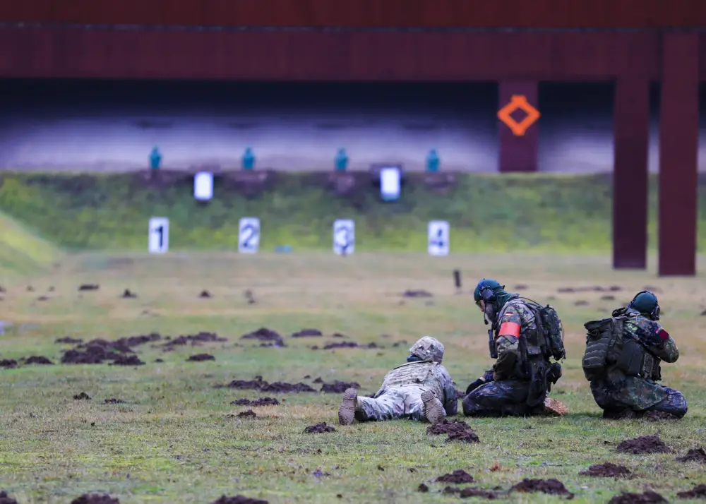 U.S. Soldiers engage targets during the German Armed Forces Badge of Marksmanship, or SchÃ¼tzenschnur, at Breitenwald Range, Feb. 5. U.S. Soldiers joined German Armed Forces (Bundeswehr) Service Members for a chance to earn the badge.