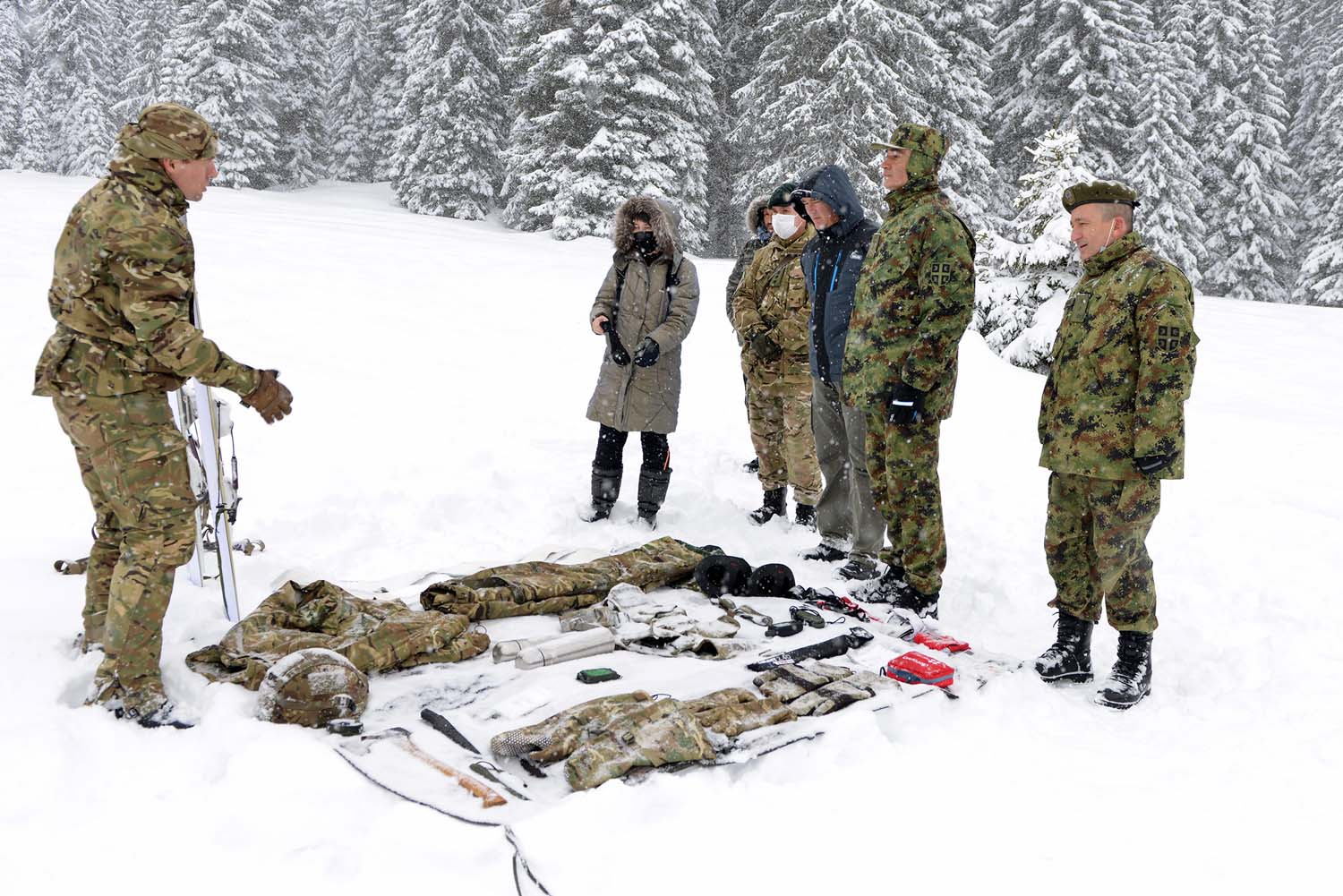 A Royal Marines Mountain Leader is joined by British Army instructors to teach Serbian forces during a ten-day training deployment
