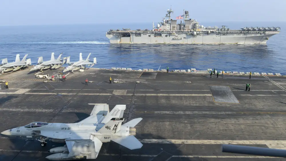 Theodore Roosevelt Strike Group and Makin Island Amphibious Ready Group Conduct Integrated Operations in South China Sea