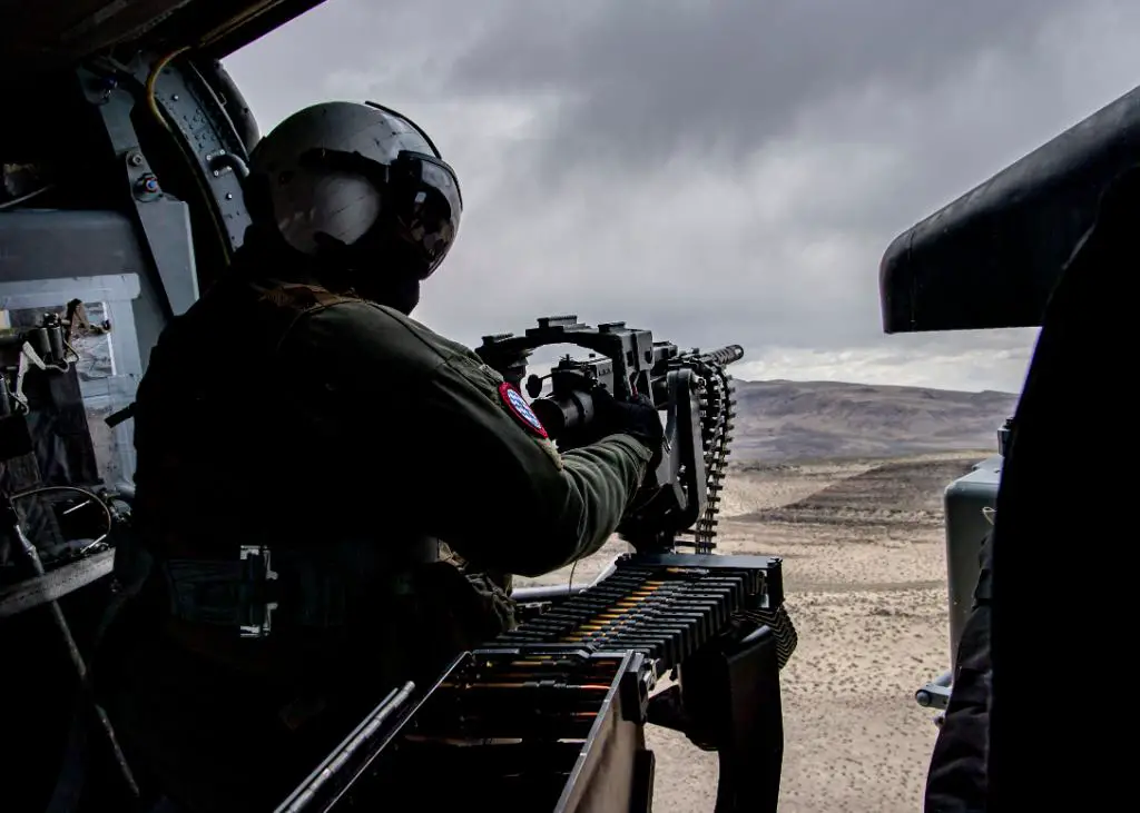 US Navy Sea Combat Squadron 4 MH-60S Helicopter Conduct Live Firing Exercise