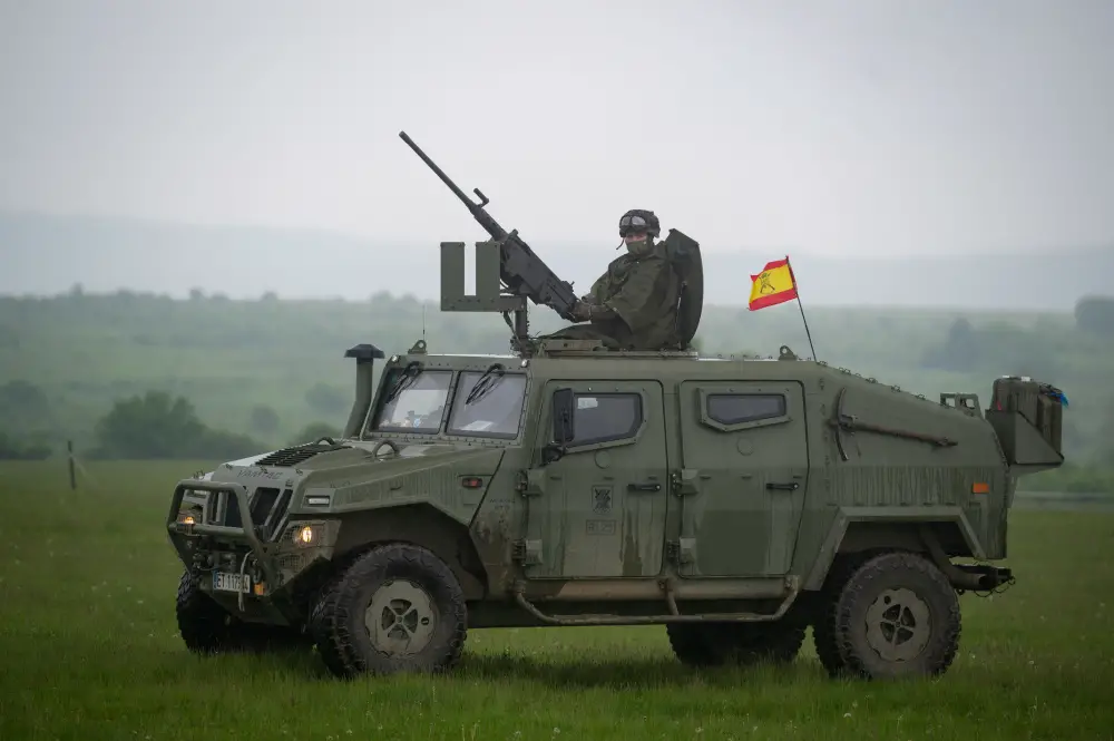 A Spanish Soldier assigned to the BRILAT Brigade mans a machine gun while training tactical vehicle manoeuvring during Exercise Steadfast Defender 2021 in Romania. More than 270 Spanish troops deployed to Romania in support of the exercise.
