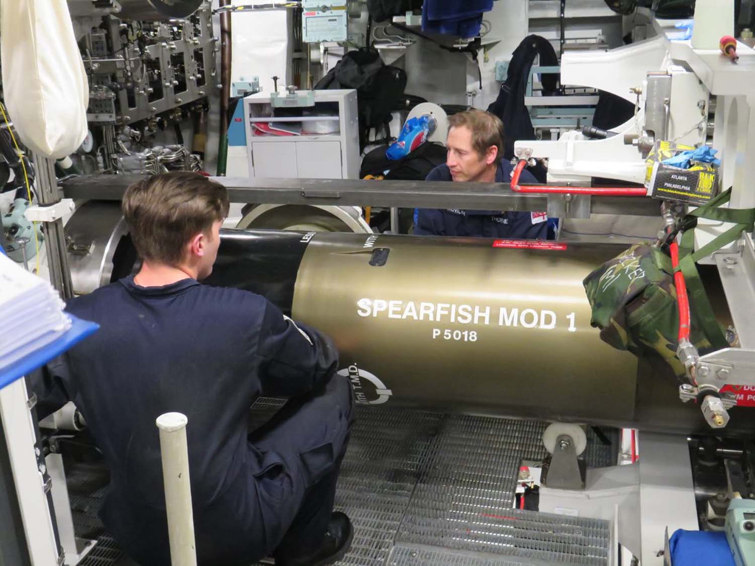 Crew preparing 'Mod-1' Spearfish torpedo for trial on-board HMS Audacious