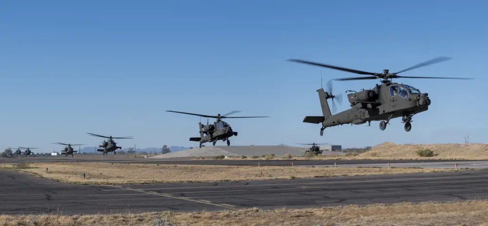 A group of AH-64E version 6 Apache helicopters depart the Boeing manufacturing facilities at Mesa, Ariz. 