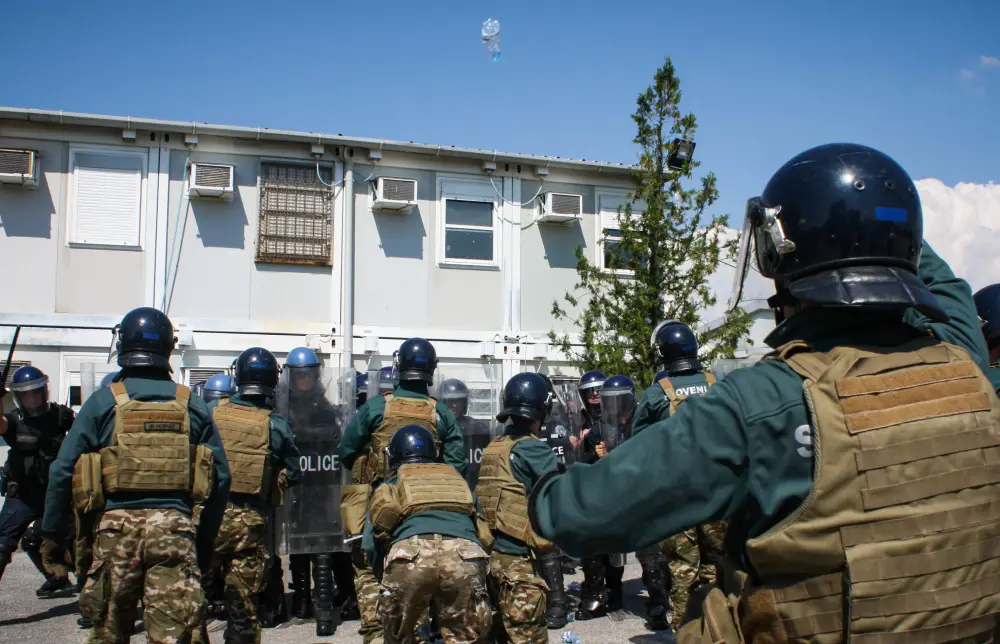 Slovenian Armed Forces soldiers clash with Kosovo Police officers during Operation Swift Rescue at the Gjakova/GjakovÃ« Airfield in Kosovo on June 10, 2021.