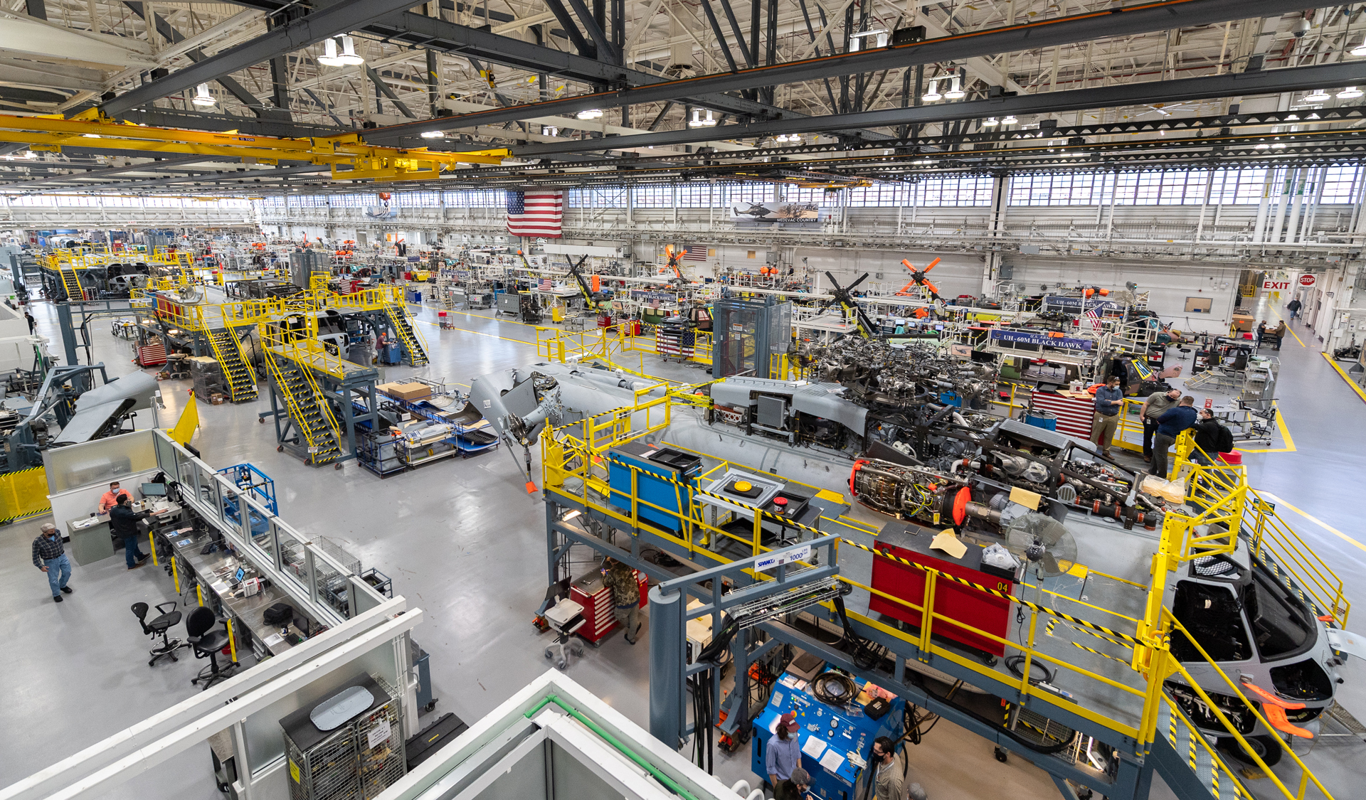  Sikorsky employees building CH-53K â„¢aircraft utilizing 3-D work instructions, new titanium machining centers with multi-floor ergonomic platforms.
