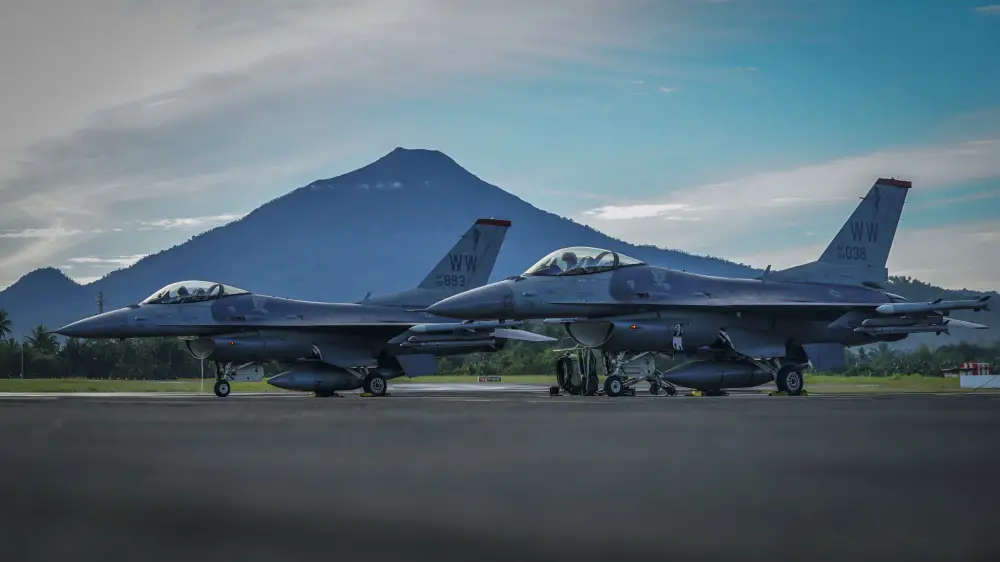 U.S. Air Force F-16C Fighting Falcons assigned to the 13th Expeditionary Fighter Squadron, 35th Fighter Wing based out of Misawa Air Base, Japan prepare to takeoff for the final sortie of exercise Cope West 18 (CW18) at Sam Ratulangi International Airport, Indonesia, March 23, 2018. 
