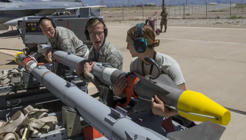 Members of the Eglin AFB 96 Maintenance Group Weapons Standardization team prepare the AIM-9X Sidewinder missile that will be used during a live fire test at Holloman Air Force Base, New Mexico, Apr. 23, 2019. The AIM-9X is the most advanced infrared-tracking, short-range, air-to-air and surface-to-air missile in the world.
