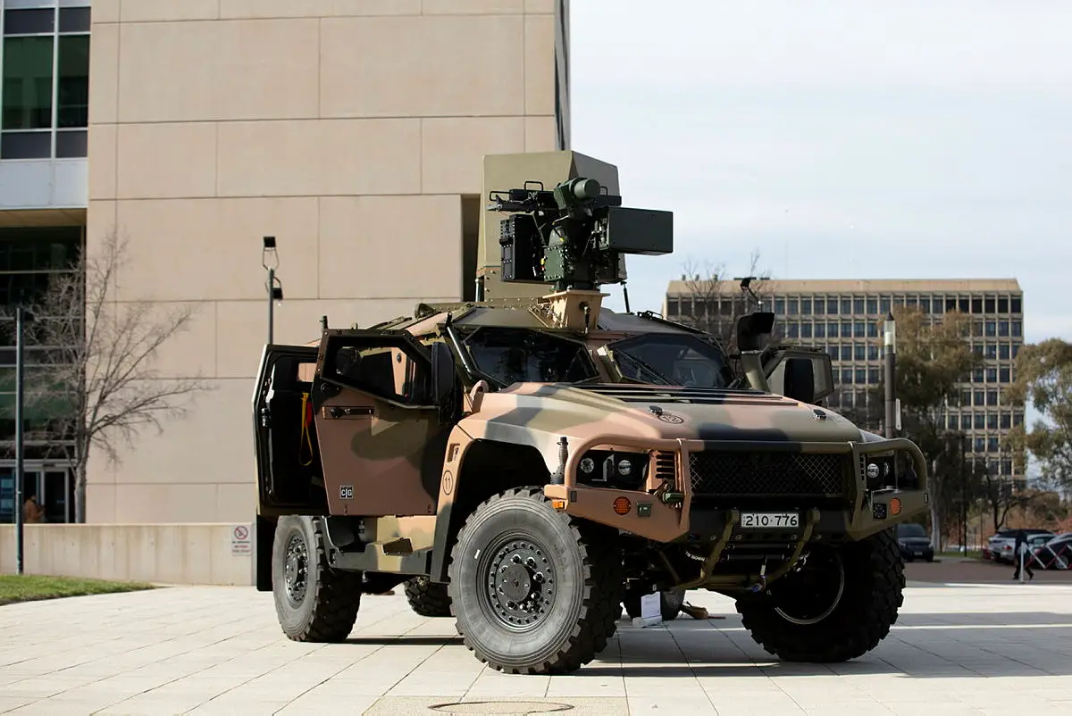 An Australian Army Hawkei Protected Mobility Vehicle with a mock-up of a CEA Technologies Tactical Radar and an Electro-Optic Systems RS400 Mk2 Remote Weapon System on display at Russell Offices, Canberra.
