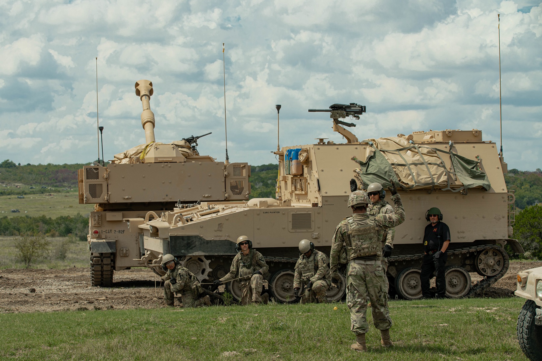 US Army M109A7 self-propelled howitzer and M992A3 field artillery ammunition support vehicle.
