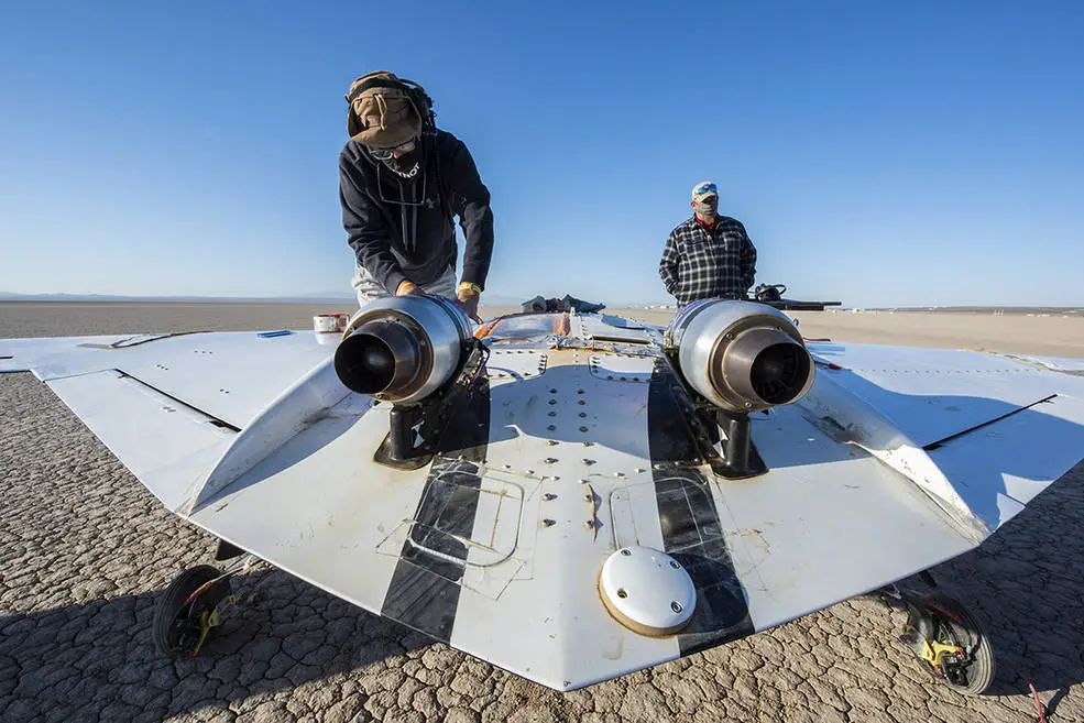 The X-56B remotely piloted aircraft ground crew prepares the aircraft to begin a new flight series. The flight was April 19 at NASA's Armstrong Flight Research Center in Edwards, California, with partner Northrop Grumman.