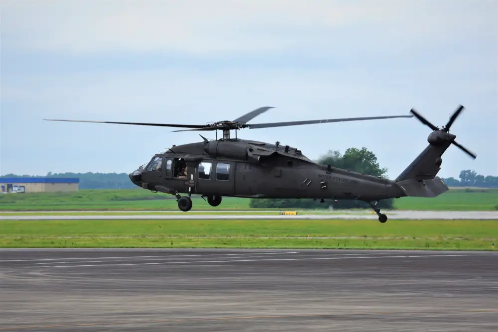 A UH-60V Black Hawk hovers during a demonstration flight at the Huntsville, Al. International Airport July 13.