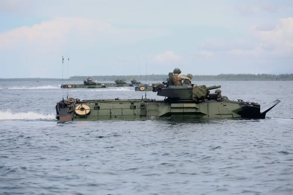  U.S. Marines conduct an amphibious exercise with service members of the Philippine Marine Corps.The service members participated in a number of classes and exercises with the Marines and Sailors aboard the USS Ashland (LSD 48) in support of exercise Cooperation Afloat Readiness and Training.