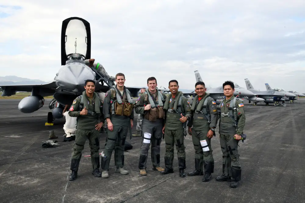 U.S. Air Force F-16 Fighting Falcon pilots pose alongside Philippine Air Force FA-50 pilots after flying a bilateral training sortie during Bilateral Air Contingent Exchange-Philippines (BACE-P) at Cesar Basa Air Base, Philippines.