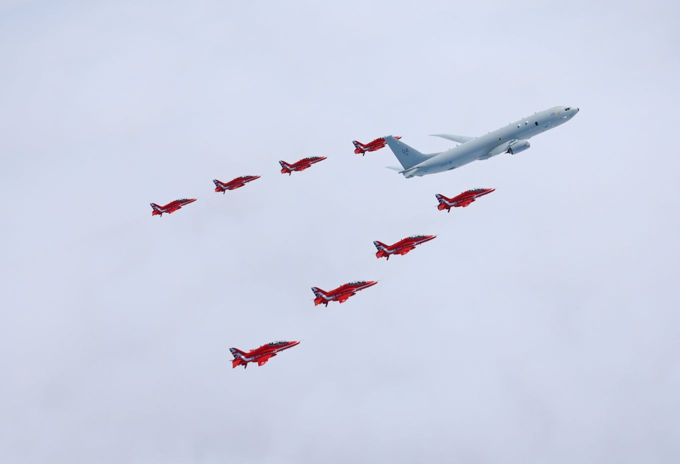 THE Royal Air Force's new submarine-hunter aircraft has flown in formation with the Red Arrows for the first time.  