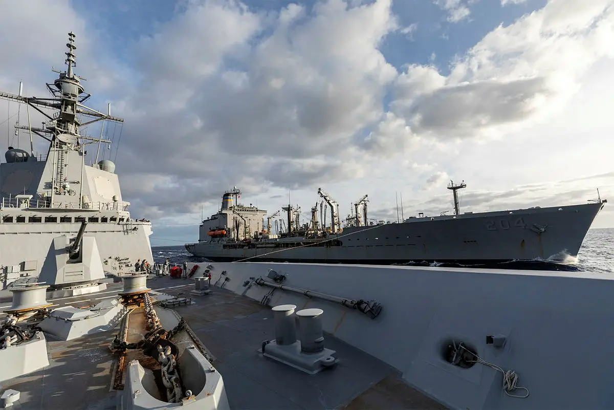 HMAS Brisbane conducts a Replenishment at Sea with USNS Rappahannock, off the coast of Queensland, during Exercise Talisman Sabre 2021.